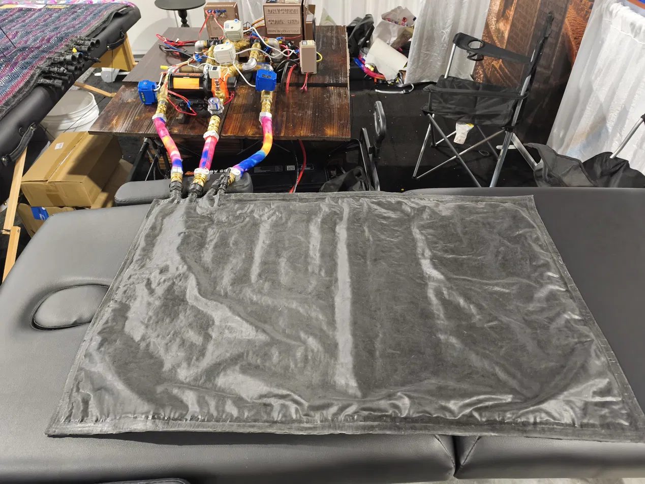 The sealed Coma Bed mat connected and laid out on the treatment table